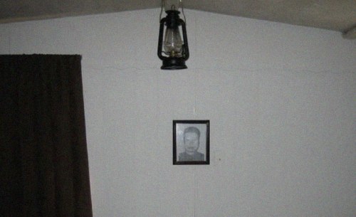 Picture of Pol Pot on the wall inside mobile home on secluded South Carolina property of the Rural People’s Party (RPP) headquarters